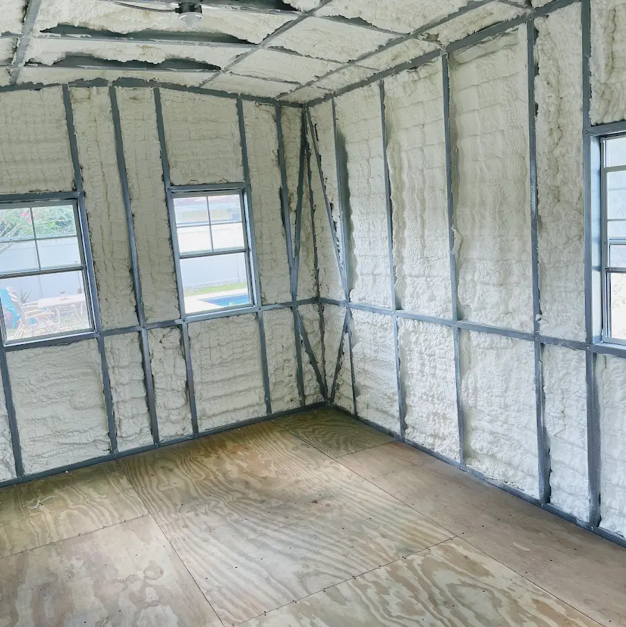 Closed-cell spray foam insulation applied to wall cavities in a residential project in Fair Lakes